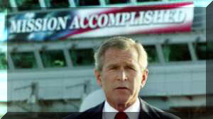Bush with Mission Accomplished sign behind him