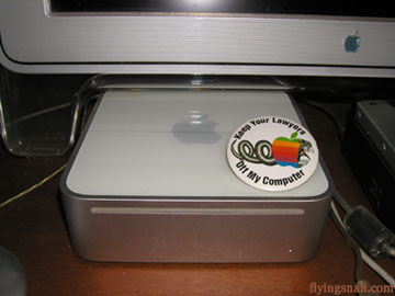 "Keep Your Lawyers Off My Computer" button on top of a Mac Mini