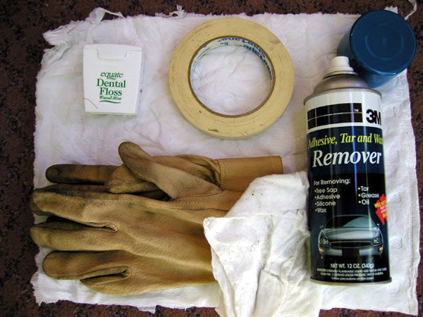Tools:
Waxed Dental Floss, tape, 3M Remover, gloves (garden), cotton helmet wipe, rag (old diaper pictured)