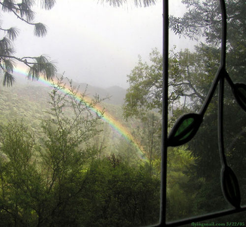 Kitchen Window, Rainbow in canyon below.